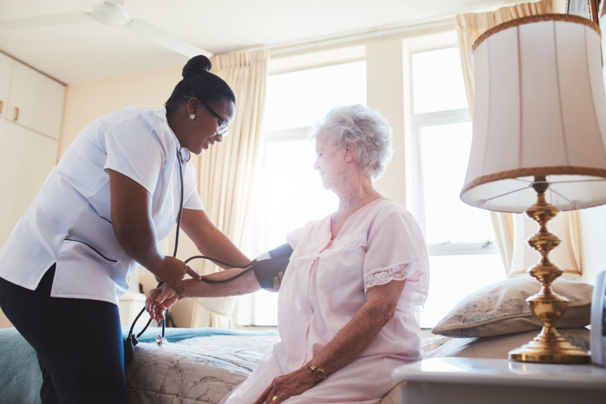 Nurse-checking-blood-pressure